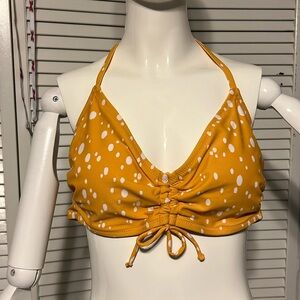 Kona Sol Bikini top Size Large Color Orange with sports all over it